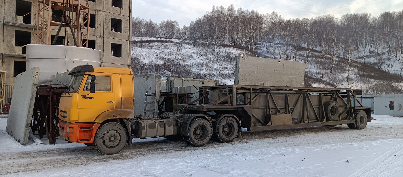 Аренда и услуги панелевозов для перевозки ЖБИ изделий в Усть-Нере